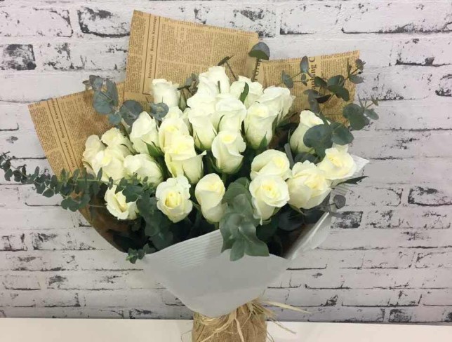 Beautiful Bouquet of White Roses and Eucalyptus in Newspaper Kraft Paper - Photo